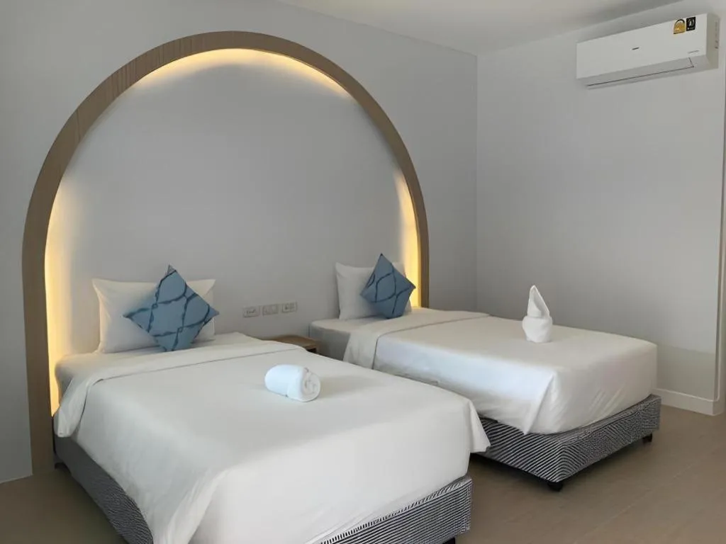 Bed in Thong Prachok Hotel