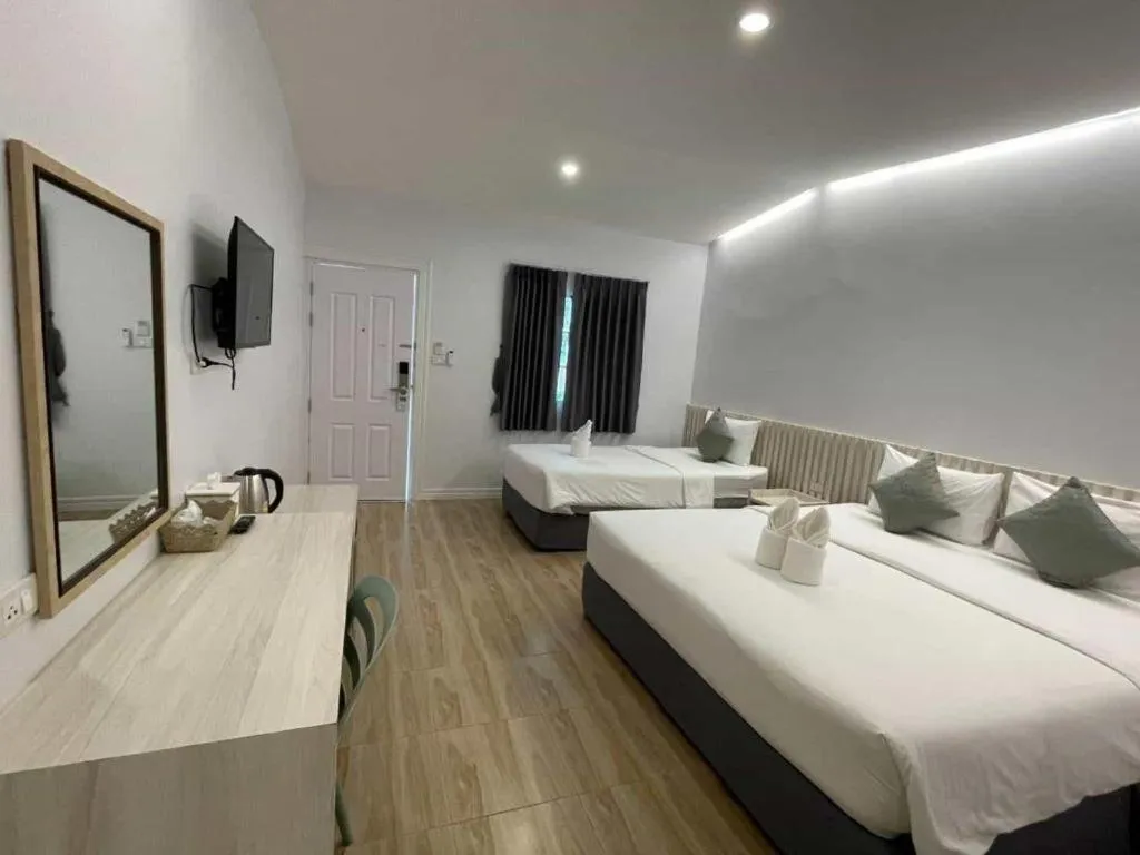 Bed in Thong Prachok Hotel