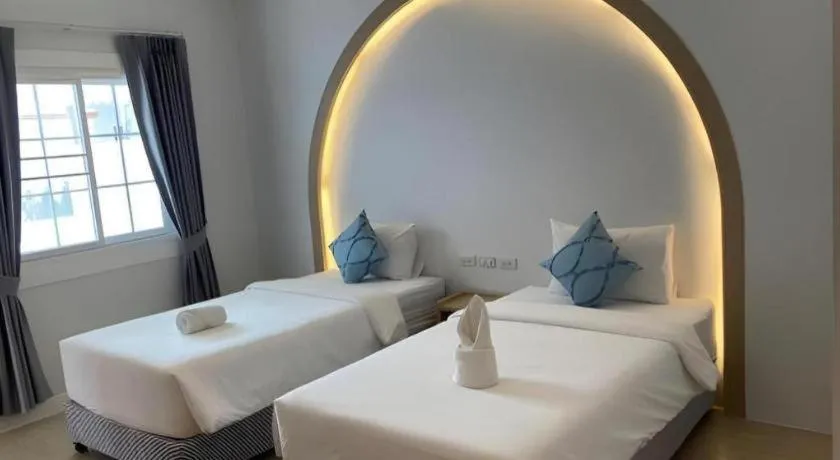 Bed in Thong Prachok Hotel