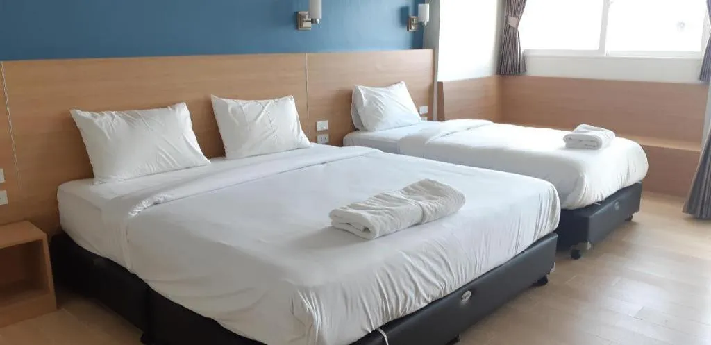 Bed in Ceniq Hotel