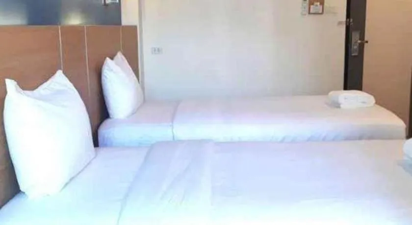 Bed in Ceniq Hotel