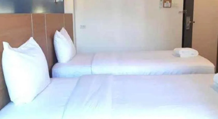 Bed in Ceniq Hotel