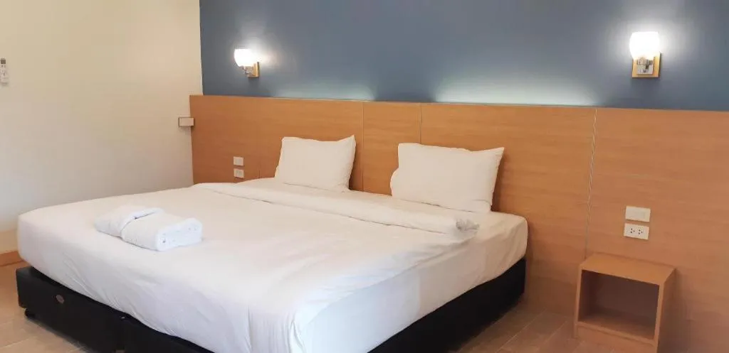 Bed in Ceniq Hotel
