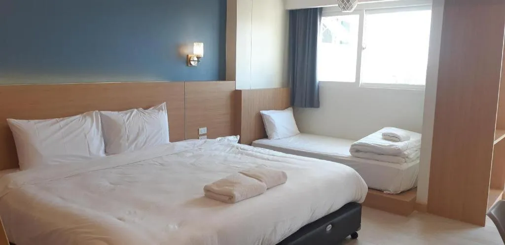 Bed in Ceniq Hotel
