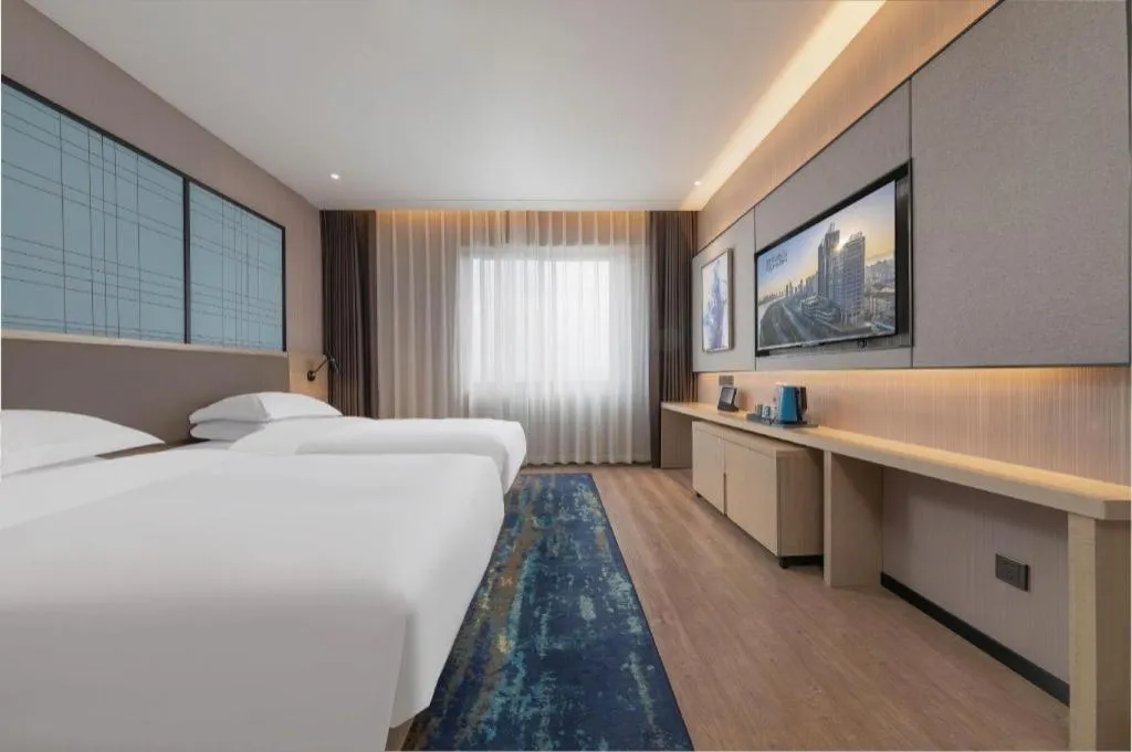 Bed in Echarm Hotel Hanzhong Wetland Park