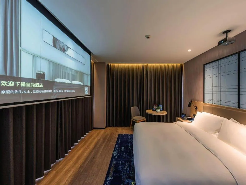 Bed in Echarm Hotel Hanzhong Wetland Park