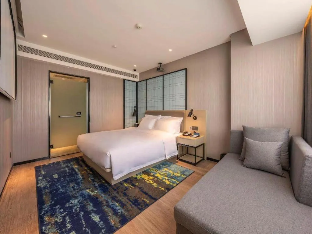 Bed in Echarm Hotel Hanzhong Wetland Park
