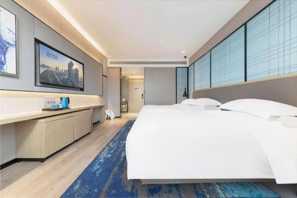 Bed in Echarm Hotel Hanzhong Wetland Park