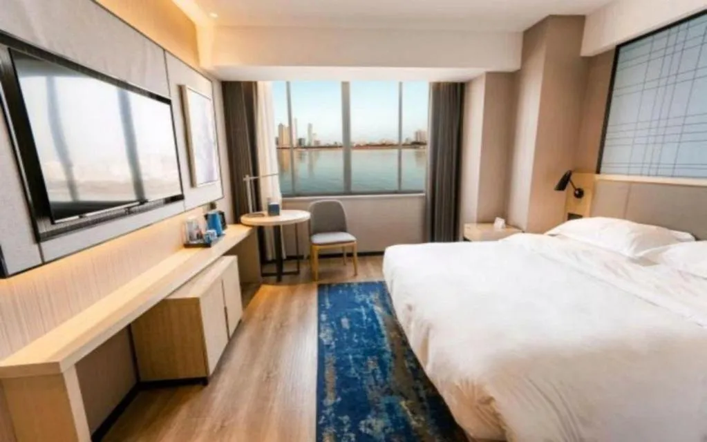 Bed in Echarm Hotel Hanzhong Wetland Park