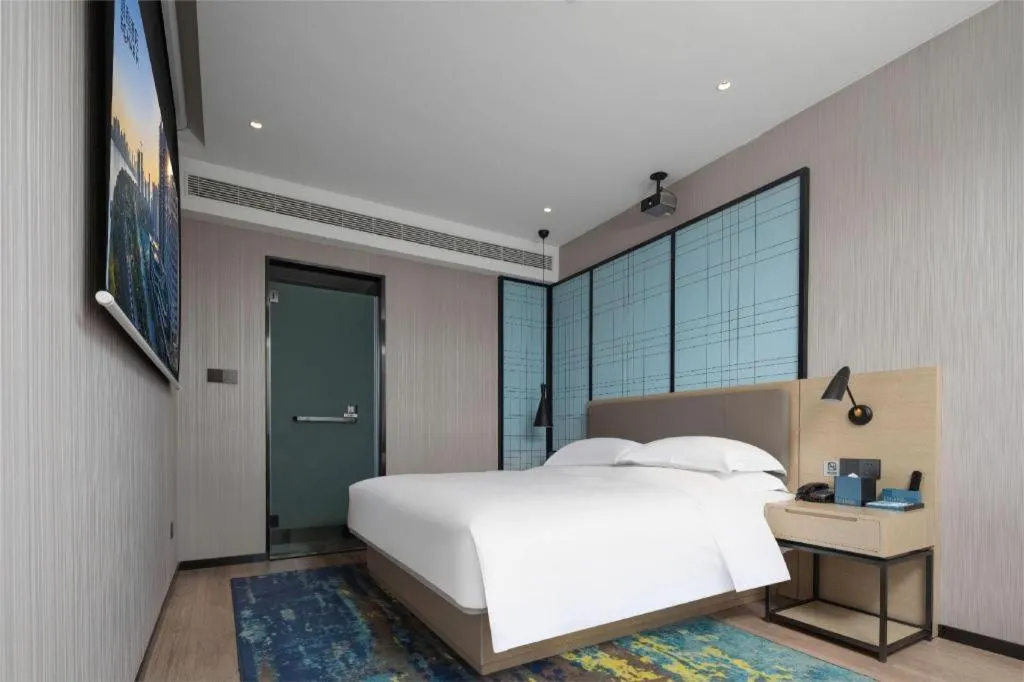 Bed in Echarm Hotel Hanzhong Wetland Park