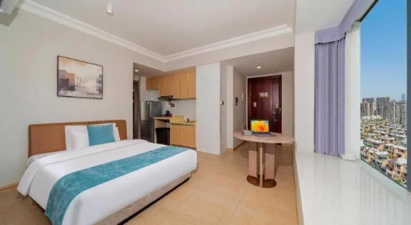 Bed in Poltton International Service Apartment Shanwei Urban District High-speed Railway Station