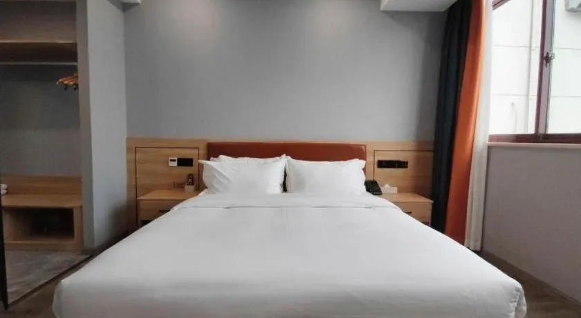 Bed in Borrman Hotel Jiangyin Zhouzhuang