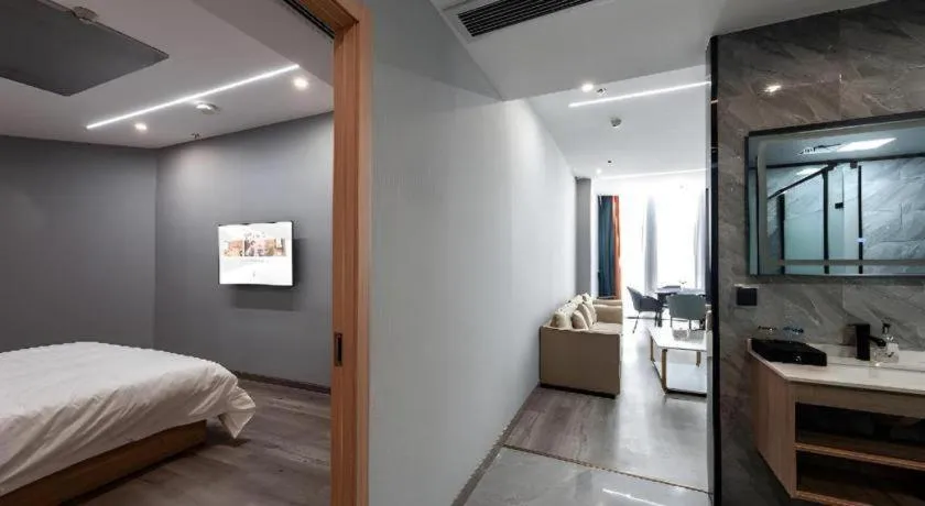 Bed in Borrman Hotel Jiangyin Zhouzhuang