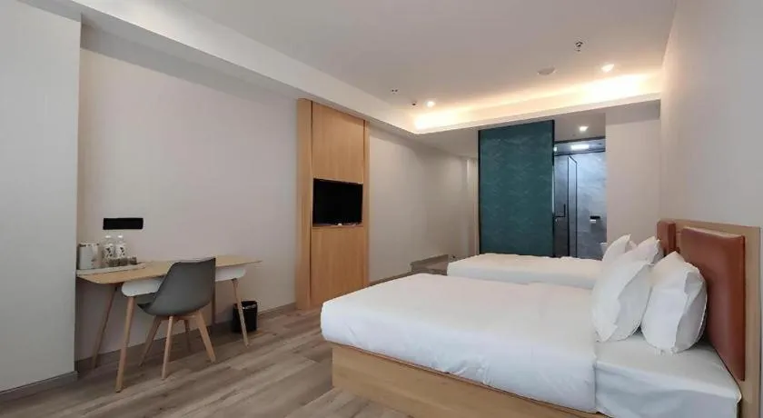 Bed in Borrman Hotel Jiangyin Zhouzhuang