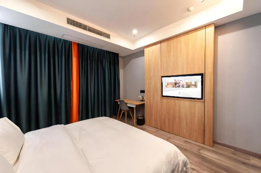 Bed in Borrman Hotel Jiangyin Zhouzhuang