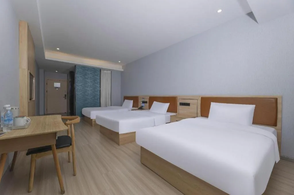 Bed in Borrman Hotel Jiangyin Zhouzhuang