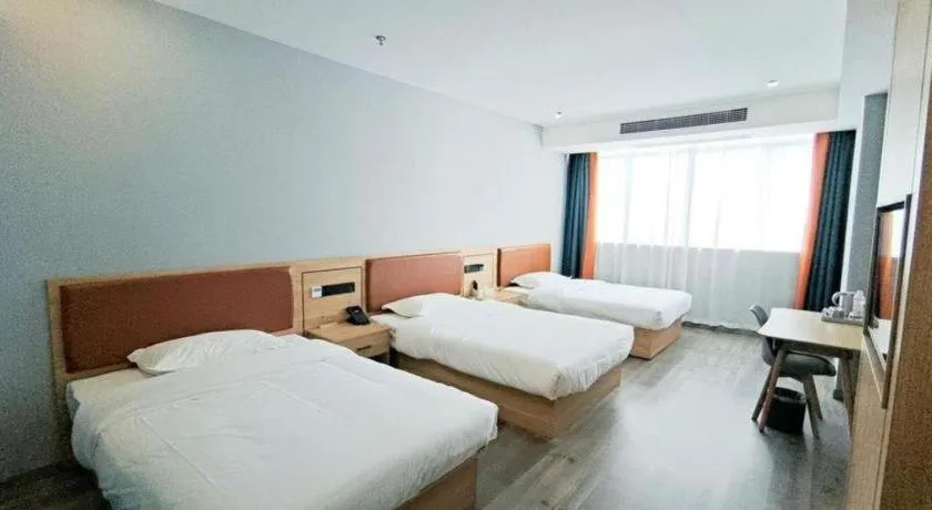 Bed in Borrman Hotel Jiangyin Zhouzhuang