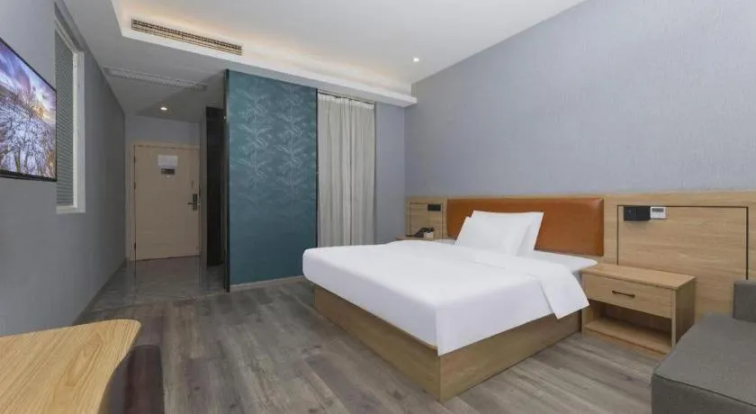 Bed in Borrman Hotel Jiangyin Zhouzhuang