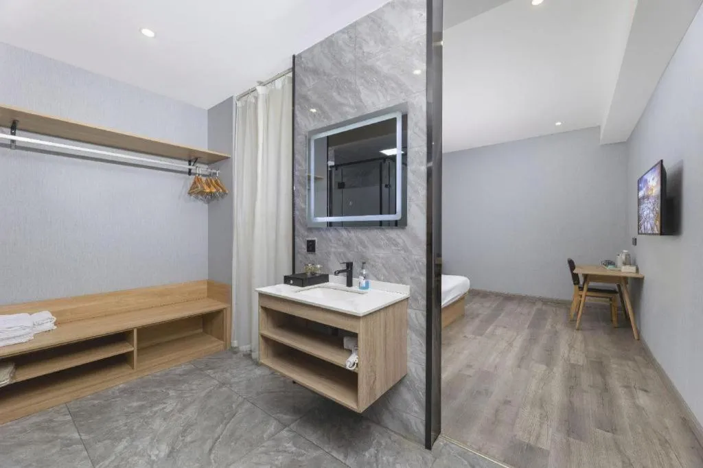 Bed in Borrman Hotel Jiangyin Zhouzhuang