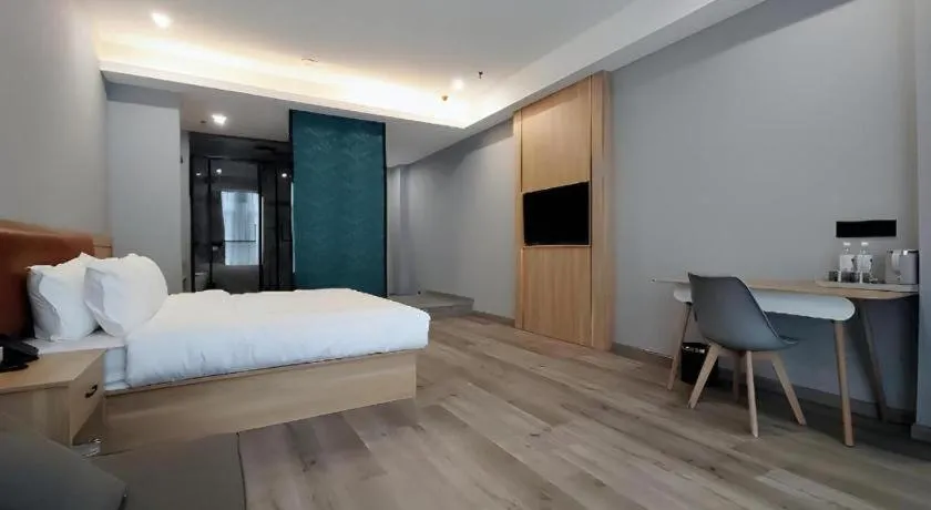 Bed in Borrman Hotel Jiangyin Zhouzhuang