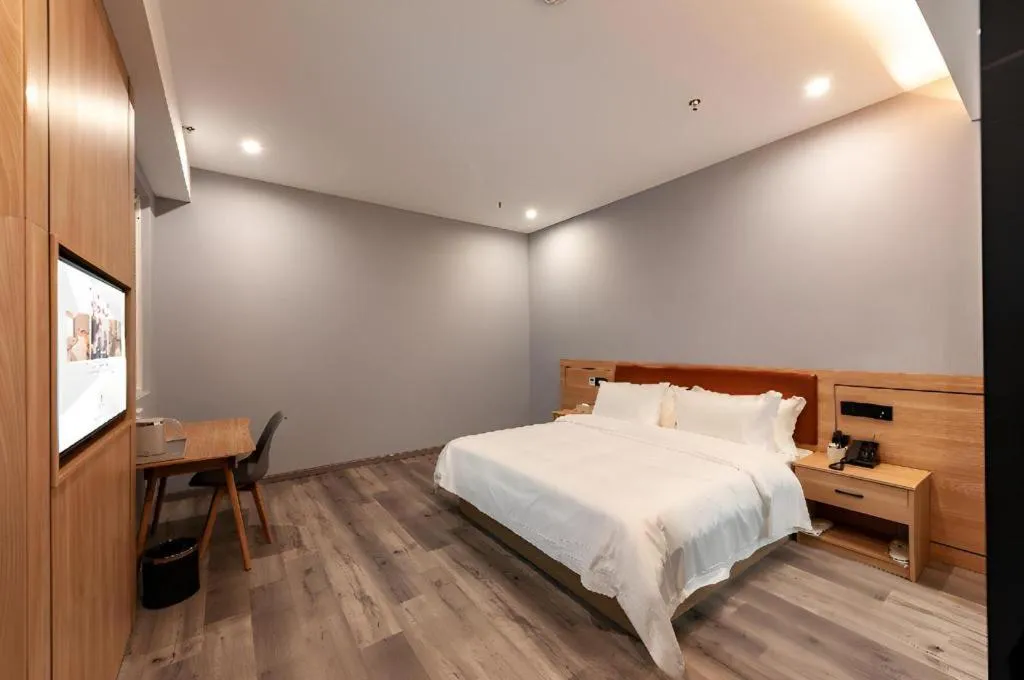 Bed in Borrman Hotel Jiangyin Zhouzhuang