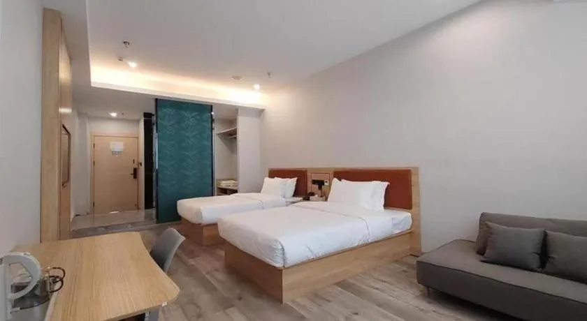 Bed in Borrman Hotel Jiangyin Zhouzhuang