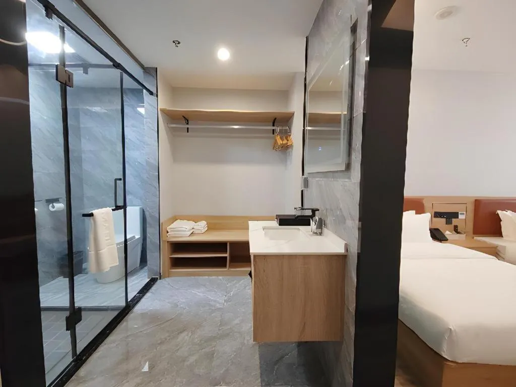 Bed in Borrman Hotel Jiangyin Zhouzhuang