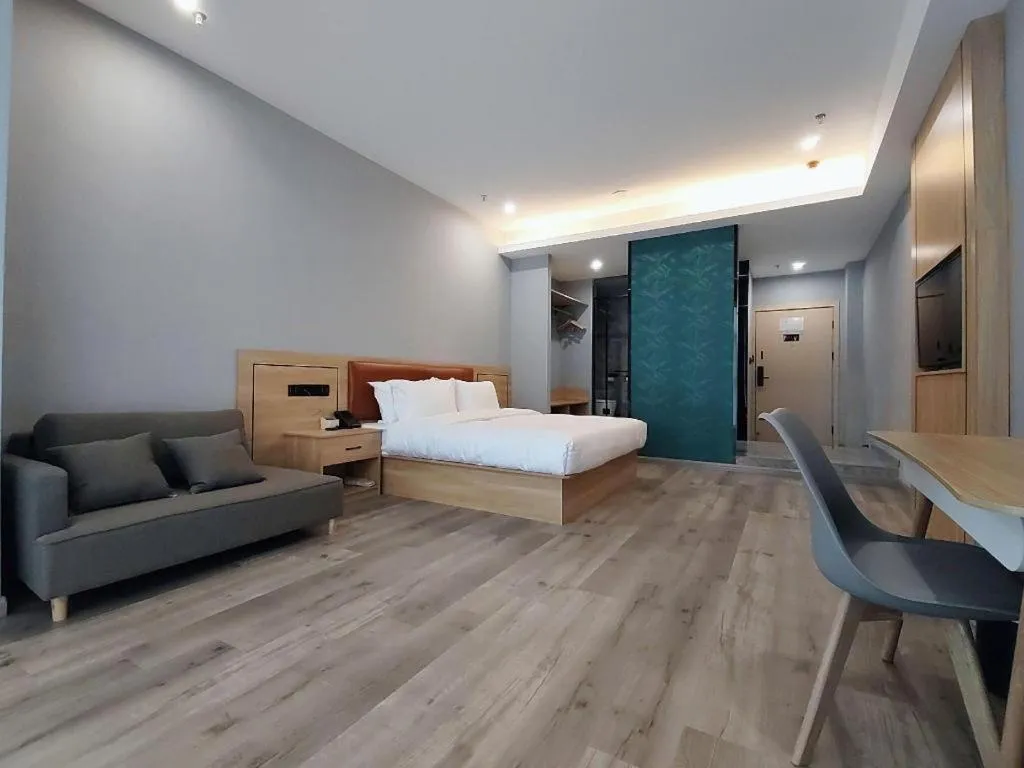 Bed in Borrman Hotel Jiangyin Zhouzhuang