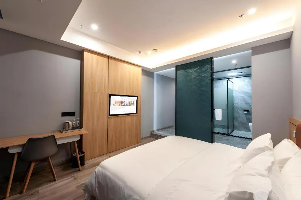 Bed in Borrman Hotel Jiangyin Zhouzhuang