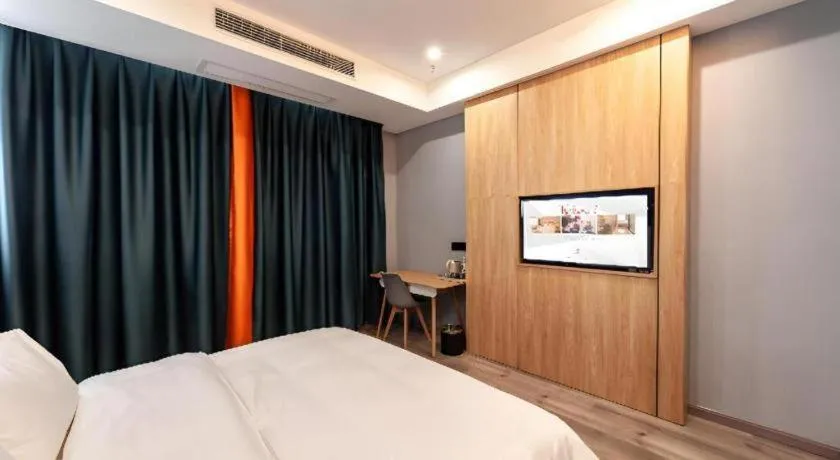 Bed in Borrman Hotel Jiangyin Zhouzhuang