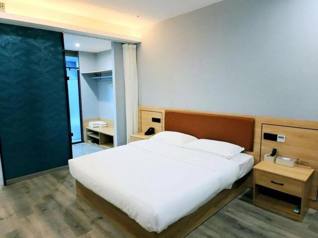 Bed in Borrman Hotel Jiangyin Zhouzhuang