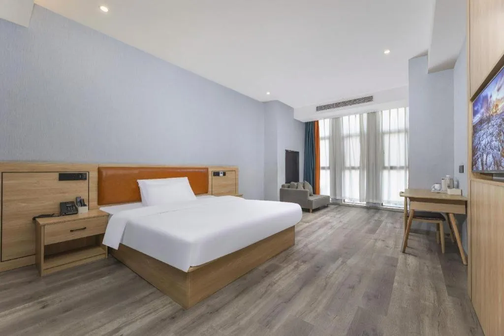 Bed in Borrman Hotel Jiangyin Zhouzhuang