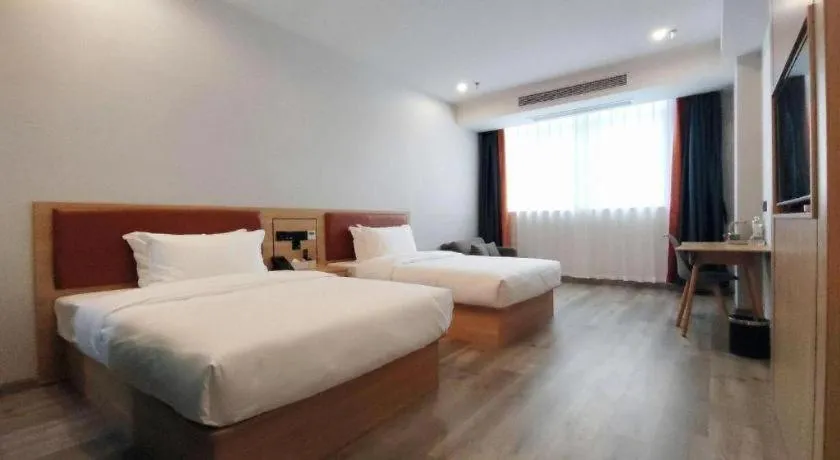 Bed in Borrman Hotel Jiangyin Zhouzhuang