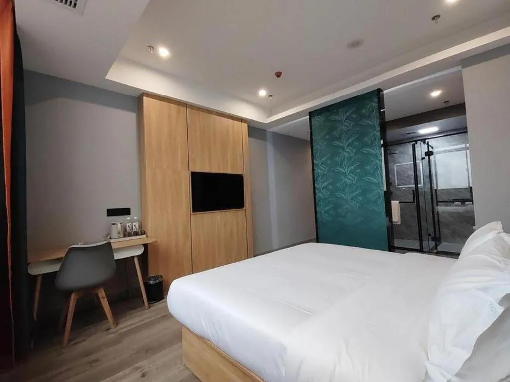 Bed in Borrman Hotel Jiangyin Zhouzhuang