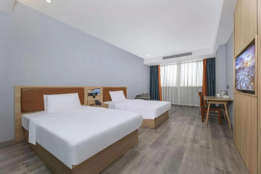 Bed in Borrman Hotel Jiangyin Zhouzhuang