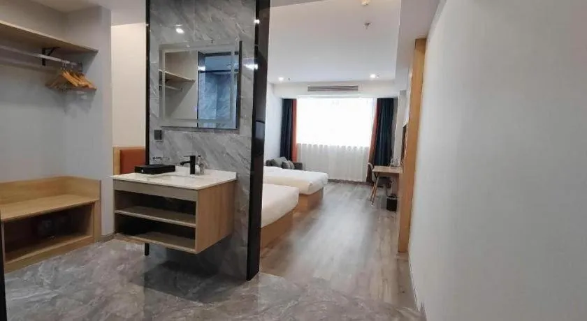 Bed in Borrman Hotel Jiangyin Zhouzhuang