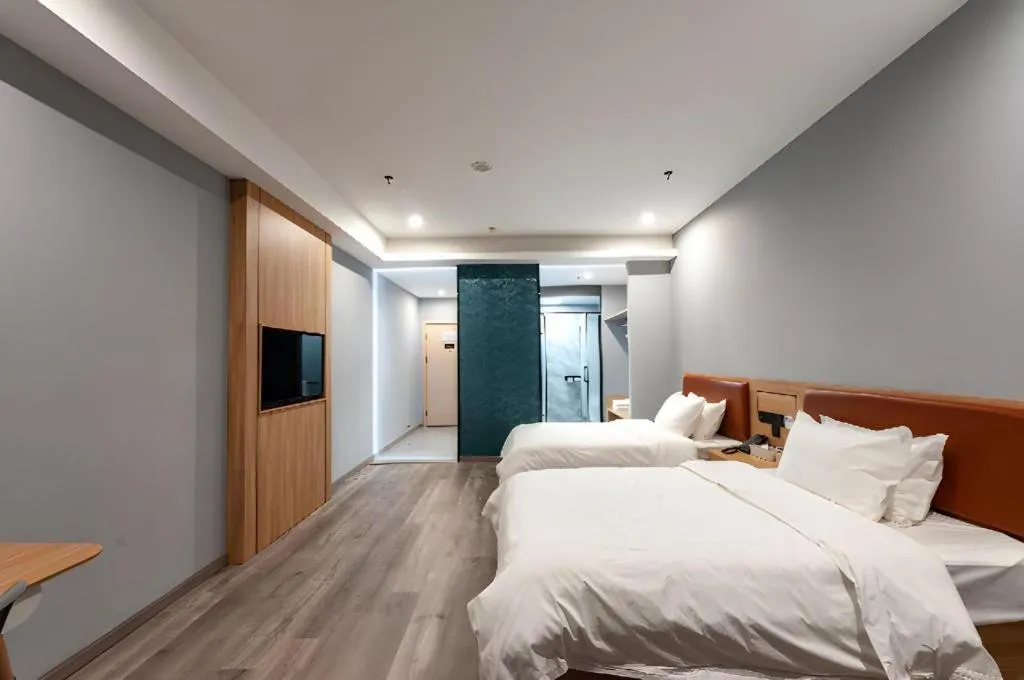 Bed in Borrman Hotel Jiangyin Zhouzhuang