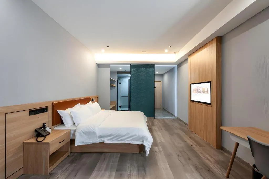 Bed in Borrman Hotel Jiangyin Zhouzhuang