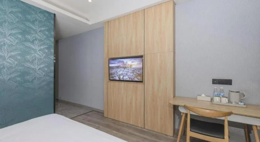 Bed in Borrman Hotel Jiangyin Zhouzhuang