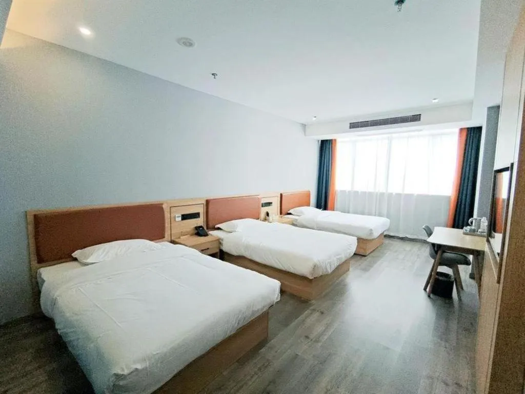 Bed in Borrman Hotel Jiangyin Zhouzhuang