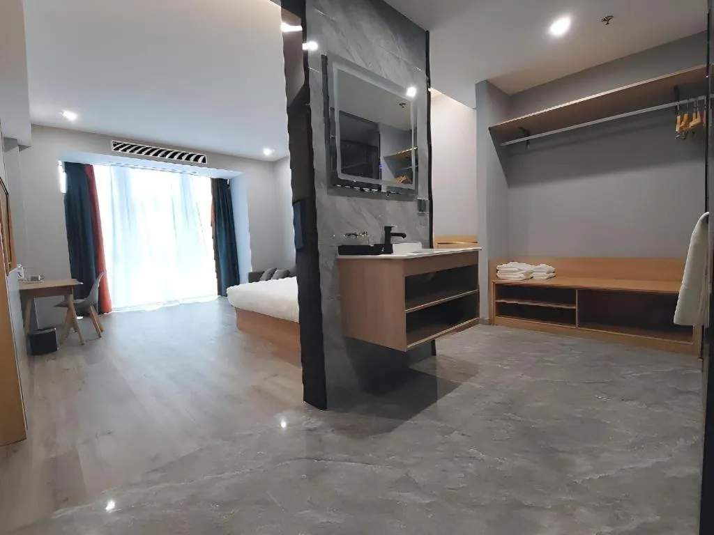 Bed in Borrman Hotel Jiangyin Zhouzhuang