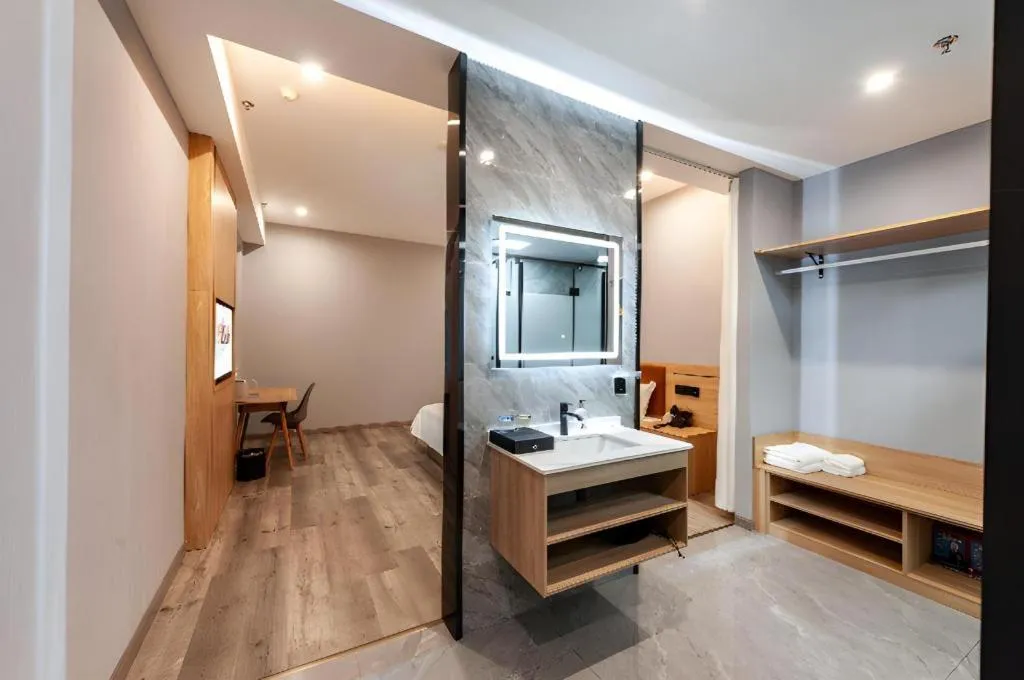 Bed in Borrman Hotel Jiangyin Zhouzhuang