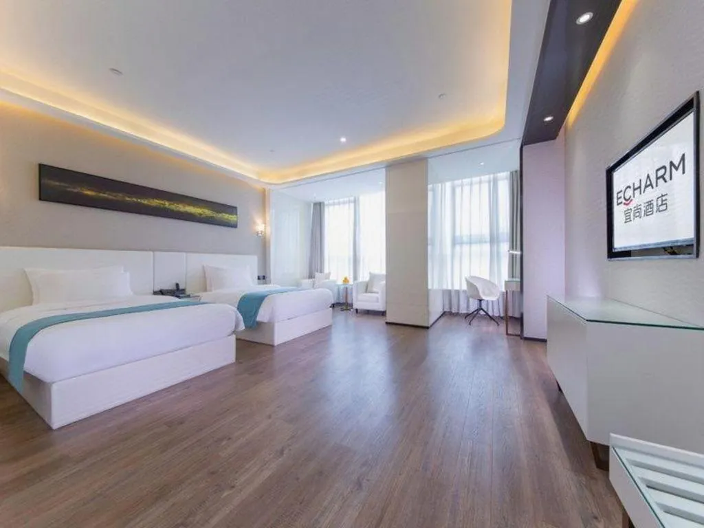 Bed in Echarm Hotel Wuhan Wusheng Road Metro Station Cade Square