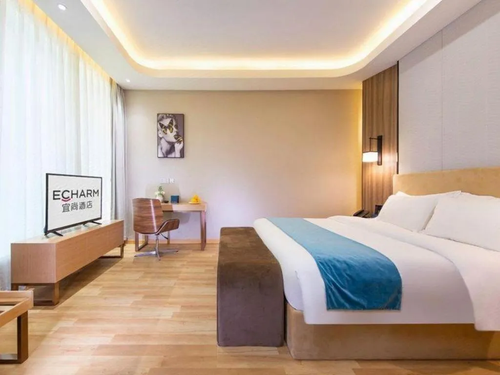 Bed in Echarm Hotel Wuhan Wusheng Road Metro Station Cade Square