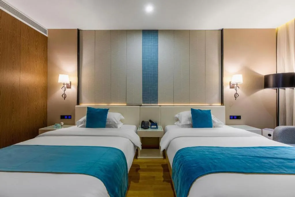 Bed in Echarm Hotel Wuhan Wusheng Road Metro Station Cade Square