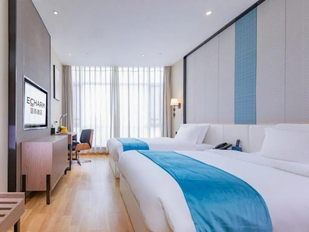 Bed in Echarm Hotel Wuhan Wusheng Road Metro Station Cade Square