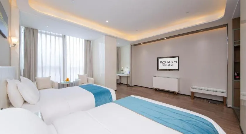 Bed in Echarm Hotel Wuhan Wusheng Road Metro Station Cade Square