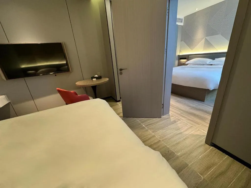 Bed in Borrman Hotel Lianjiang Avenue Xinyuan International Plaza