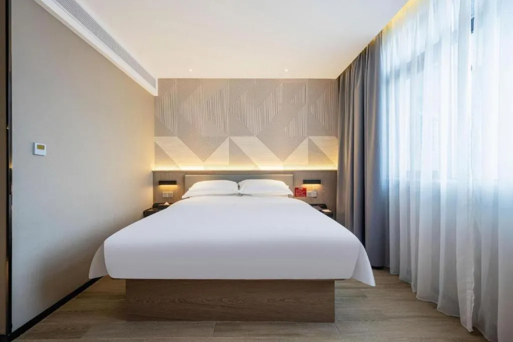 Bed in Borrman Hotel Lianjiang Avenue Xinyuan International Plaza
