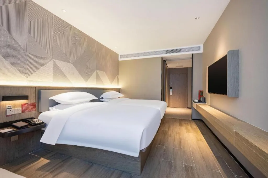 Bed in Borrman Hotel Lianjiang Avenue Xinyuan International Plaza